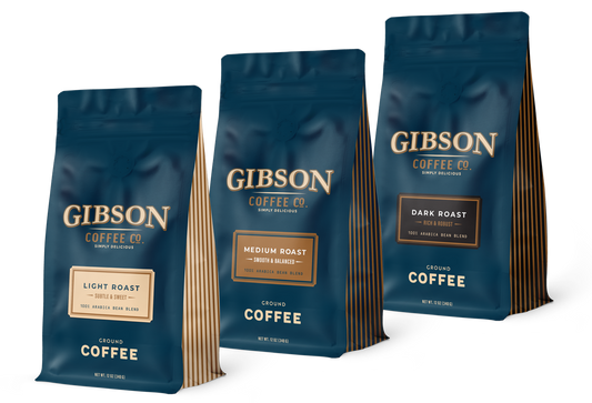Gibson Coffee ground sampler featuring Light, Medium, and Dark Roast Arabica coffee bags.
